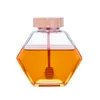 honey jar with wooden dipper