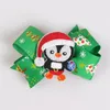 Moda dziecięca świąteczne klipy do włosów 100pcs Dzieci Święty Mikołaj Snowman Snowman Penguin Sair Spin Cut Kidstree Bow Barrettes