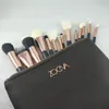 Pędzle marki Zestaw 15 sztuk / zestaw Profesjonalny zestaw pędzla do makijażu Eyeshadow Eyeliner Mieszanie narzędzi kosmetyków ołówek z torbą
