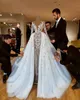 Sparkly Luxurious African 2019 Vestidos de novia Vestidos de novia de encaje con cuentas Vestidos de novia de manga larga Vestidos de novia transparentes