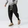 남자 겨울 두꺼운 양모 캐주얼 바지 일본 패션 느슨한 하렘 바지 남성 긴 웜 부츠 바지 플러스 크기 M-5XL