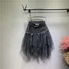 Kjolar sommar denim jeans kjol kvinnor oregelbunden hög midja tulle mesh patchwork fickor pläterad mittkalv tutu 2021 street1