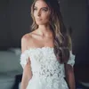 2020新しい安いセクシーなボハミアンのラインのウェディングドレスオフショルダーアップリケレースの花半袖チュールヴェスティドボーフォーマルな花嫁のドレス