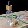 30ml Clear Glass Essential Oil Dropper Bottle Cosmetic Pipette Container Packaging Bottle Eco Friendly Wooden Bamboo Lid