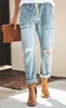 Tasche elastiche in vita da donna Jeans Fori in denim Pantaloni Pantaloni larghi strappati al ginocchio