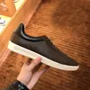 Män Fritidsskor kvinnor Resor 100 % läder snörning sneaker mode dam designer Löparträningsskor Bokstäver kvinna sko Platta tryckta gym sneakers storlek 35-41-42-45 Med låda