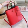 Bolso tipo cubo para mujer, bolsos de hombro, bolsos de cuero auténtico, bolsos de mensajero para mujer, bolso cruzado con estampado de flores, monedero