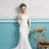 Abiti da sposa a sirena in tulle a maniche lunghe Sweep Train 2019 Abiti da sposa sottili con applicazioni in pizzo con collo gioiello