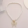 Colliers avec pendentif papillon en strass pour femmes, chaîne de perles, ras du cou, bijoux Boho