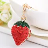 Strawberry Red Lovely Glass Pendante Car Purse Sac Key Chain Chain Chain Bijoux Série Cadeau Fruit NOUVEAU CORTICE DE MODE TRENDY UNISEX219M