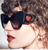 Wholesale-luxury sunglasses European and American retro metal hinged cat eye sunglasses Gorgeous red heart decoration sunglasses