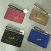 新しい輝く光沢のある輝く硬貨の財布デザイナーの女性の財布リストレットスターズブランドデザイナークラッチバッグジッパーPUデザイン高級バッグ工場
