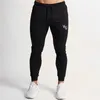 New Mens Joggers Pantaloni Casual Pantaloni Abbigliamento Abbigliamento Sportswear Bottoms Skinny Sweatpants Pantaloni Pannelli maschili Gyms Workout CrossFit Brand Pantaloni da pista