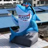 Requin drôle gonflable personnalisé de 5m H assis sur le modèle de requin gonflable en pierre pour la publicité ou le divertissement