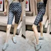 2020 Nya Kvinnors Gaze Is Silk Tyg Sommar Solskyddsmedel Elastisk Midja Moon Print Skinny Tunn Kort Femte Leggings Sport Yoga Tight Pants