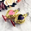 12ml Metal Perfume Bottle Royal Heart Shaped Essential Oils Bottle with Dropper Hollowed Out Alloy Wedding Gift Decoration231f