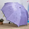 Parapluies de voyage créatifs fleur dans l'eau parapluie coloré à trois plis arqués tous temps avec des cadeaux de revêtement