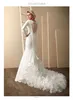 Elegante Valerio Luna Abiti da sposa a sirena Scollo a V Manica lunga Applique in pizzo con paillettes Ruffles Abito da sposa Sweep Train robe de mari￩e