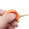 シリコンラバークロスオーバーペンシルグリップペンホルダー子供のための筆記爪