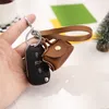 Creativo Mini Pu Hasp auricolare SD Coin Card di immagazzinaggio del sacchetto delle donne della moneta del raccoglitore della borsa della moneta di caso portachiavi Cinghia di sicurezza