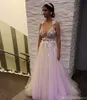 2019 Sexy Deep V Neck Boho Hobe une ligne en tulle avec des applications florales 3D Boues de mariée de jardin de plage perlé Vestido de Novia