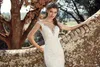 Niesamowite czyste nowe rękawy koronkowe sukienki syreny na szyję na tiulowe aplikacje ślubne suknie ślubne z guzikami vestidos de novia
