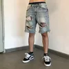 shorts de jeans desgastados