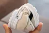 Novos designers de padrões de botas esportivas infantis malha de lã de atletismo respirável meninos e meninas tênis de corrida tênis de bebê novos meias sho1183935
