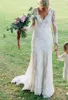 Vintage Lace Mermaid wedding Dresses with Illusion Long Sleeves Appliqued V Neck with Buttons Back Sweep Train Western Garden Bridal Gowns