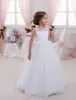 Nya billiga blomma tjejer klänningar för bröllop Juvel Neck Lace Appliques Beaded Ball Gown Hollow Back Födelsedag Barn Tjej Pageant Klänningar