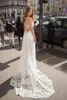 2020 Abiti da sposa con scollo a V profondo Tulle Applicazioni di pizzo Spacco laterale Abiti da sposa da spiaggia Bottoni Indietro Sweep Train Boho vestido de novia