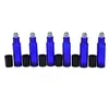 سعر الجملة 10 مل الزجاج الأزرق على زجاجات مع الكرة المعدنية والأغطية السوداء لرعاية الجمال العطرية الزيت