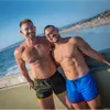 Новые Дизайнерские Шорты Мужские Бодибилдинг Fast Dry Boardshorts Бегуны Колено Спортивные штаны Летние Тренажерные Залы Фитнес Тренировки Пляж Короткие