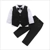 Stile gentiluomo 2020 Nuovi set di abbigliamento per neonati Bel ragazzo a righe Top con papillon + pantaloni 2 pezzi Set Abiti per bambini Set per bambini