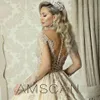 Luxury Beaded Pearls Long Sleeves Ball Gown Wedding Dresses Appliques Sequins Taffeta Arabic Dubai Bridal Gowns Chapel Train robes3403845