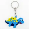 Ny Hot Selling Cartoon Dinosaur Key Ring Populära nyckelringar för barn gåvor Dinosaur Tematik kreativ present Silikon jul nyckelring
