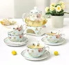 Ceramica 15 PCS Flower Tea Set British Afternoon Black Tea Set Teiera in vetro riscaldabile Bone China Tazze da tè e piattini