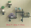 Antieke industriële waterpijp home decor zitkamer met planken bloem rack op de muur gemonteerde massief houten partitie boekenplank