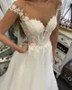 Bir Çizgi Gelinlik Seksi Sheer V Boyun Dantel Aplikler Kolsuz Sweep Tren Tül Vestido De Noiva Mariage Özel