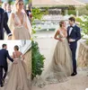 Hot Sale Champagne Elegant Wedding Dresses Sexy V-neck Backless Appliqued Lace Beaded Bridal Gown Beach Custom Made Sweep Train Bridal Dress