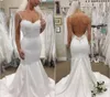 2019 New Mermaid Bröllopsklänningar Spaghetti Straps Neck Satin Brudklänningar Lace Appliqued Backless Simple Wedding Dresses Cheap Court Train