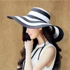 jujuland 2018 nouvel été femme chapeaux de soleil visière chapeau grand bord noir blanc rayé chapeau de paille décontracté en plein air casquettes de plage pour les femmes C1902024357