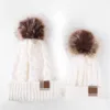 Chapeau tricoté Parent-enfant hiver chaud Imitation fourrure de raton laveur Pom chapeau bébé maman solide Pom Pom bonnet casquette de Ski casquettes tricotées