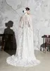 Elegante Zuhair Murad Brautkleider in A-Linie mit Wickel-V-Ausschnitt, ärmellose Brautkleider mit Spitzenapplikation und Sweep-Zug-Robe de Mari￩e