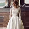 Ny billig Mellanöstern En linje Bröllopsklänningar Juvel Neck Lace Appliques Illusion Knapp Tillbaka Sweep Train Plus Storlek Anpassad Billiga Bröllopklänningar