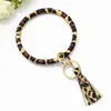 Llavero de cuero PU con estampado de leopardo, pulsera, brazalete, llavero circular, llavero con borla de cuero, soporte para pulsera, joyería de moda 239z