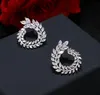 Fashion-New fashion 18K gold plated designer earrings leaf shape CZ crystal brass women earrings for party wedding Gift