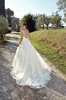 Sexy elegante weiße Spitze eine Linie Brautkleider schiere Flügelärmel Tüll Spitze Applique Hochzeit Brautkleider Robe de Mariée mit Knöpfen