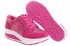 Vendita calda-Scarpe tonificanti Sport da donna per donna Scarpe da ginnastica con zeppa altalena in tela con plateau Scarpe tenis feminino