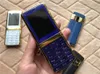 듀얼 SIM 카드 카메라 블루투스 차가운 금속 본체 잠금 해제 핸드폰 금속 미니 싱글 8800 휴대 전화와 럭셔리 바 가죽 휴대 전화